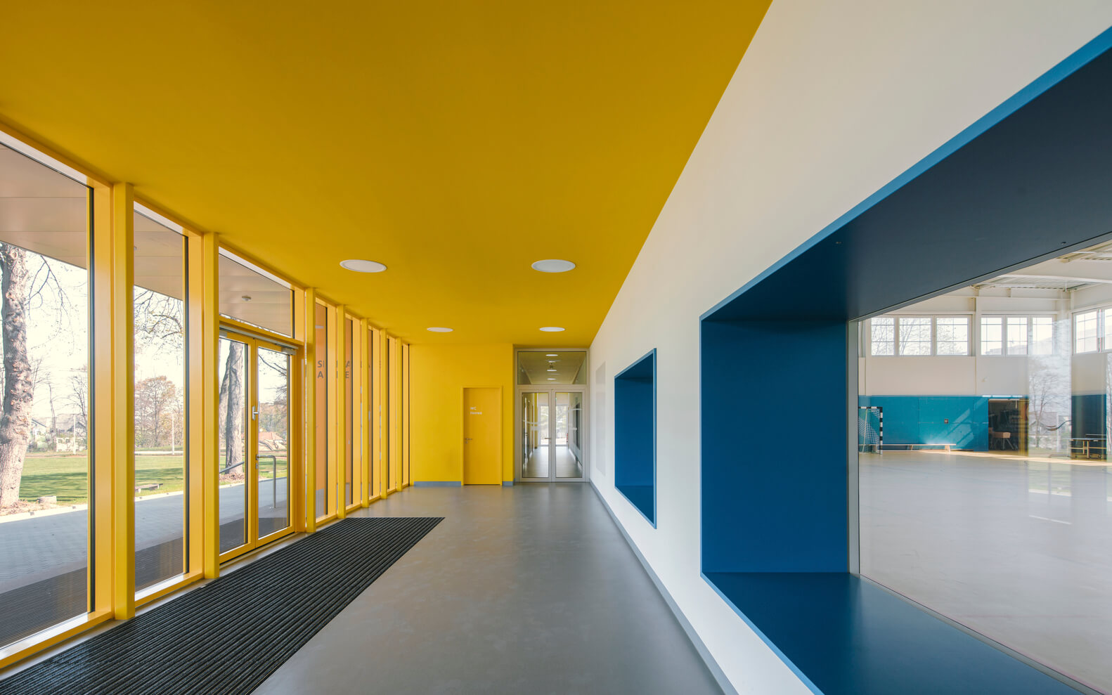 yellow and blue entrance with transparent window