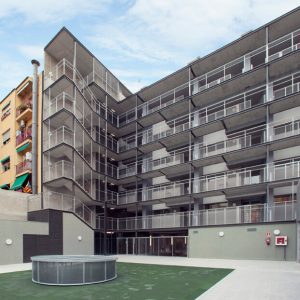 Apartment Building and Learning Center In Barcelona in expanded metal fence